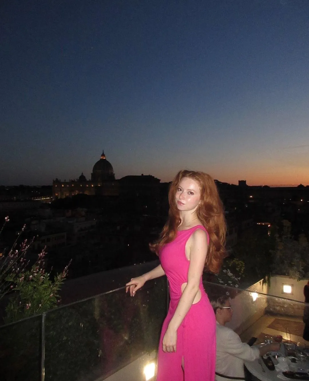 Redhead in a pink dress