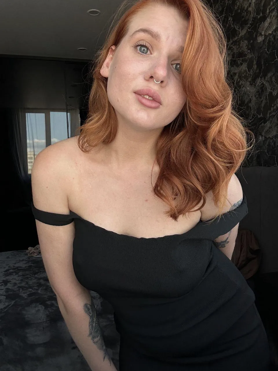 Big-breasted redheaded girl