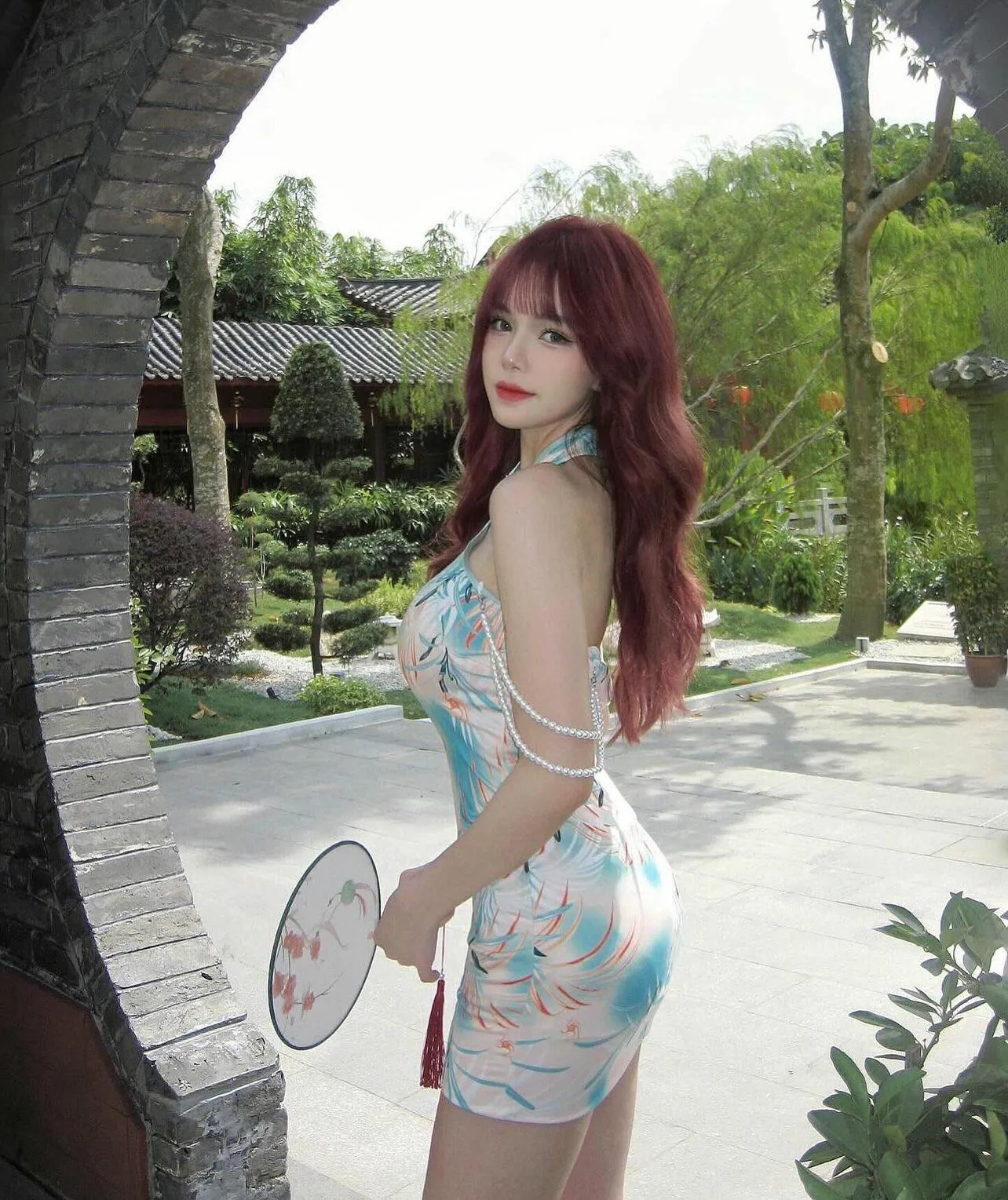 Busty asian redhead