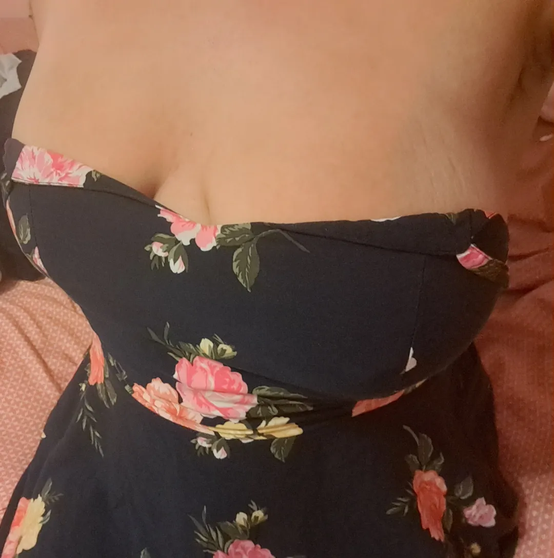 Sitting braless in a sundress