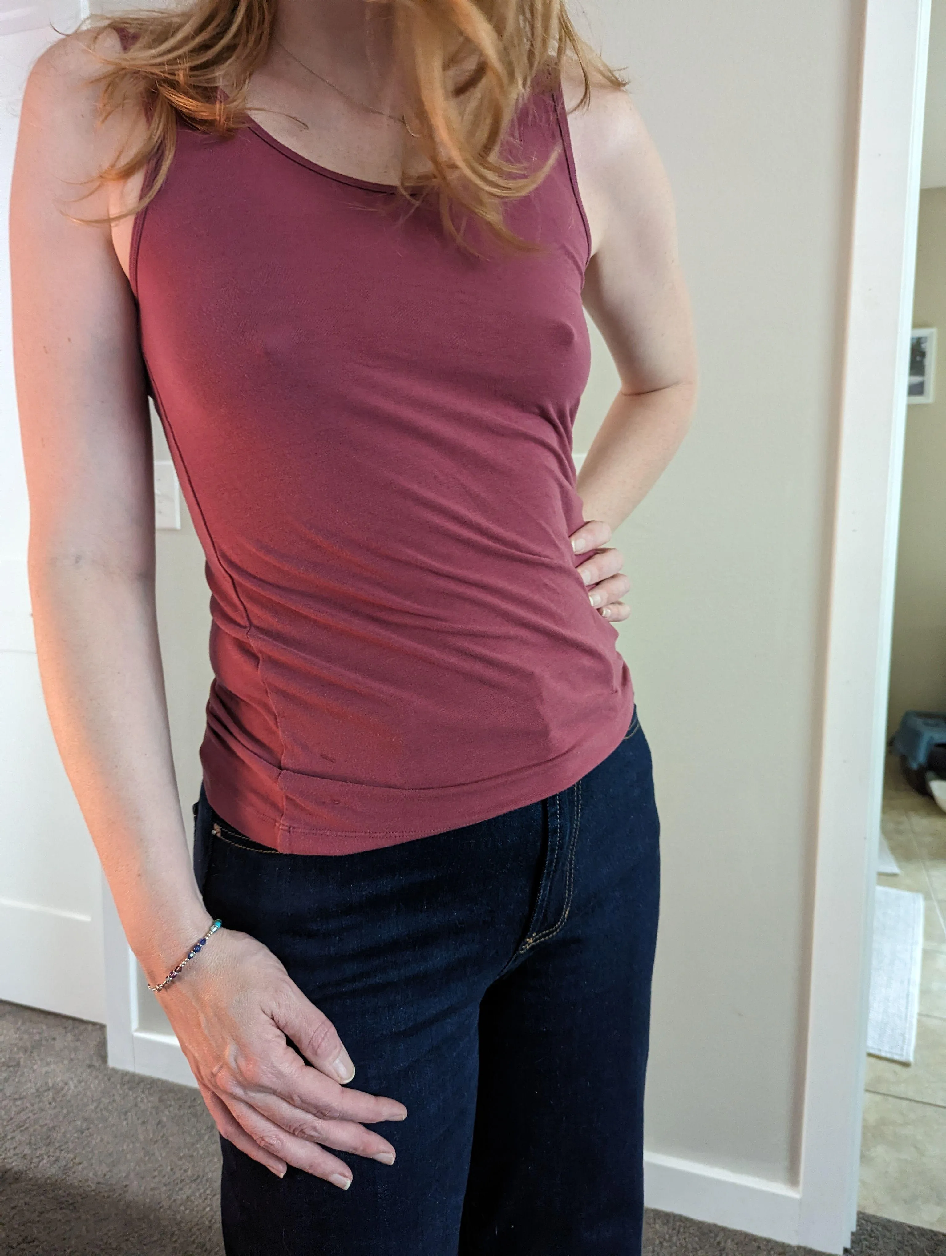 Can&#039;t go wrong with a braless tanktop and jeans.