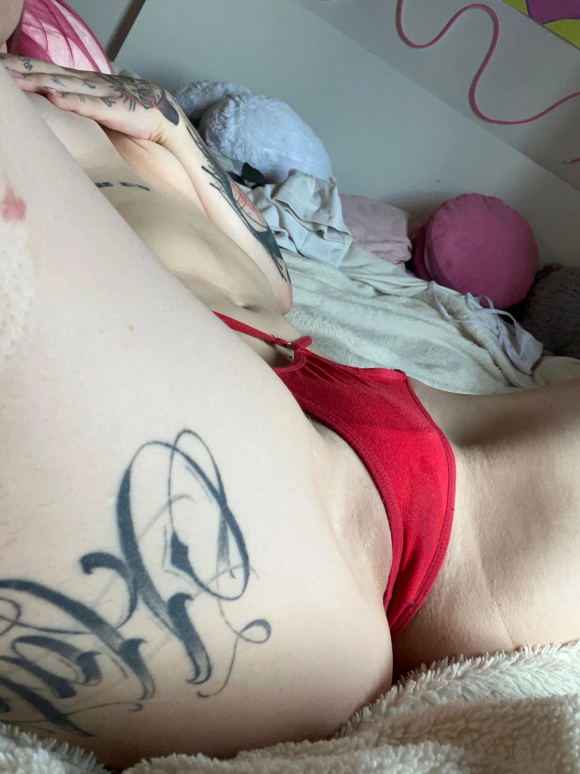 red lingerie looks very flattering on pale skin