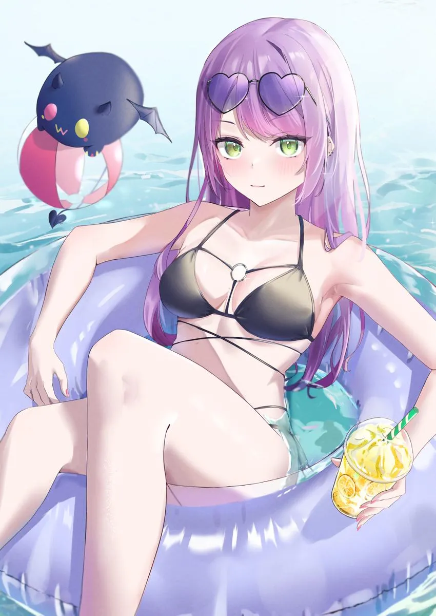 Towa relaxing on donut buoy