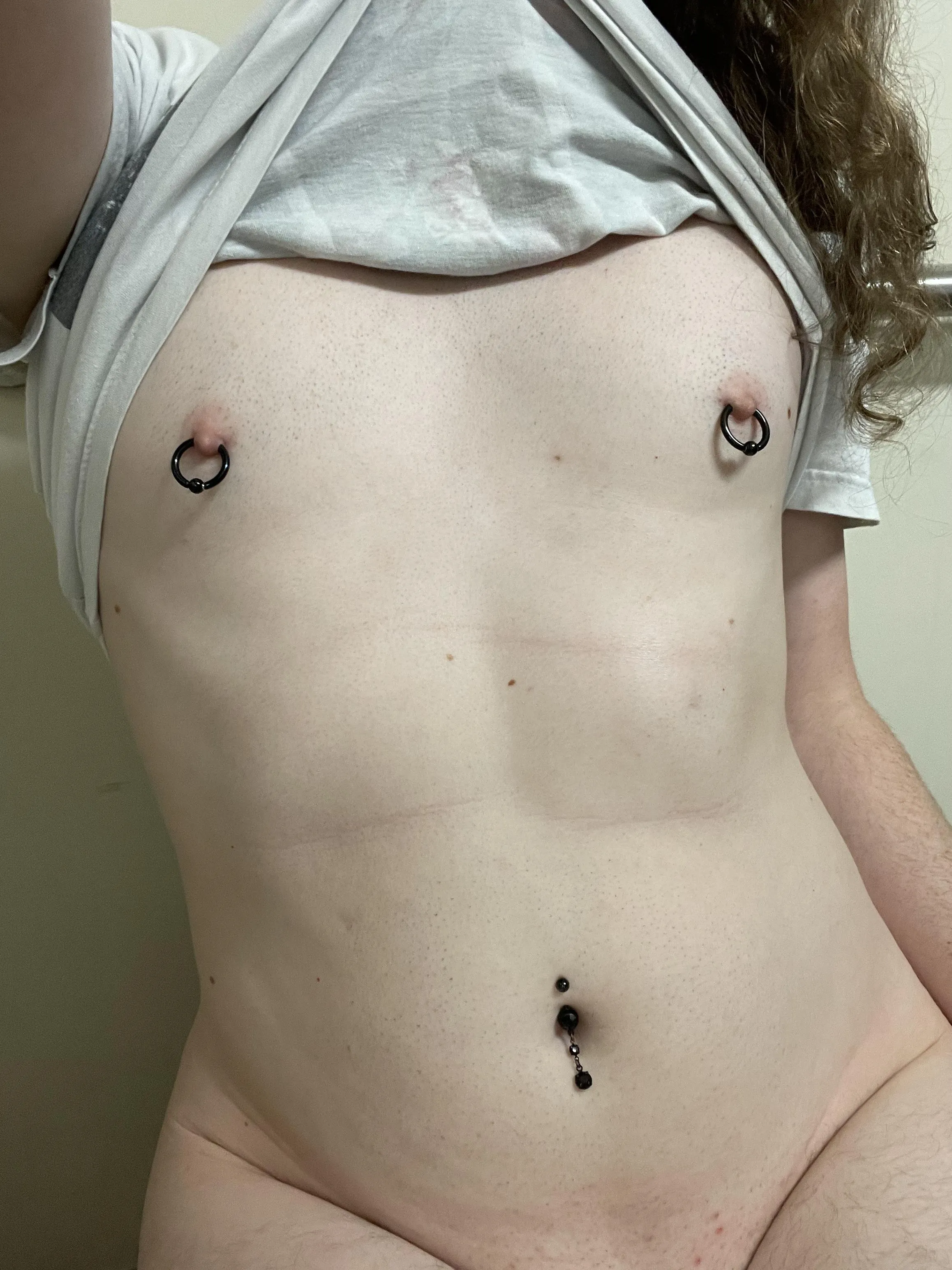 I love showing off my little pierced tits