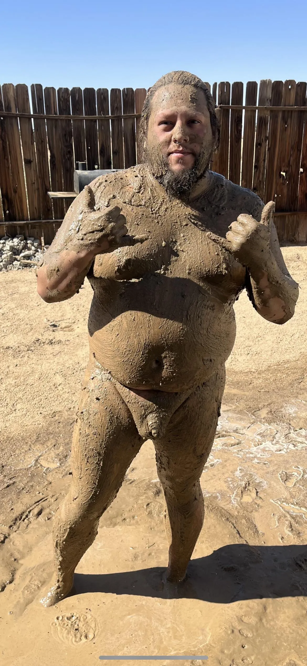 34  57  240lbs mud bath to keep cool in this heat wave