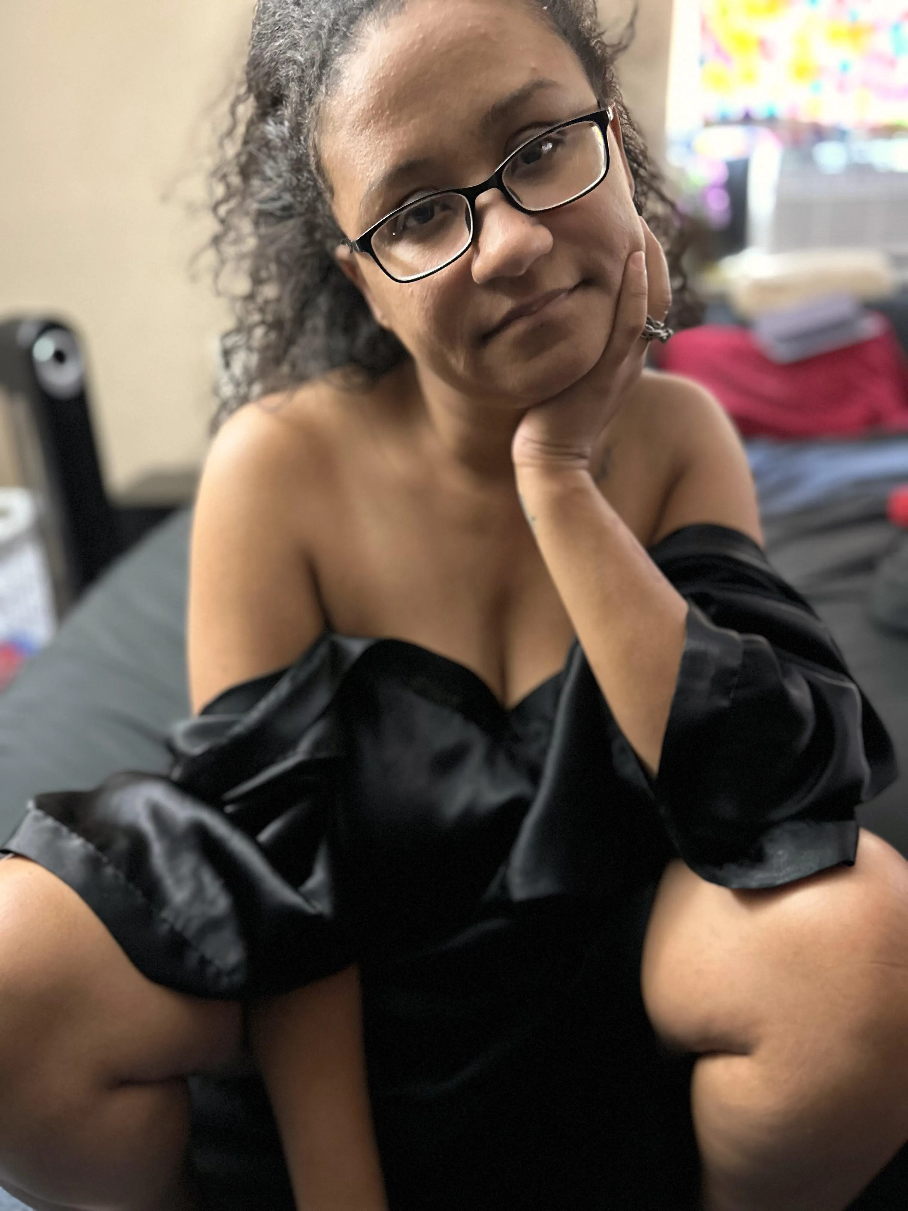 Just relaxing in my silk black robe. Come see whats under it.  Link in comments. Free to subscribe. See you soon!