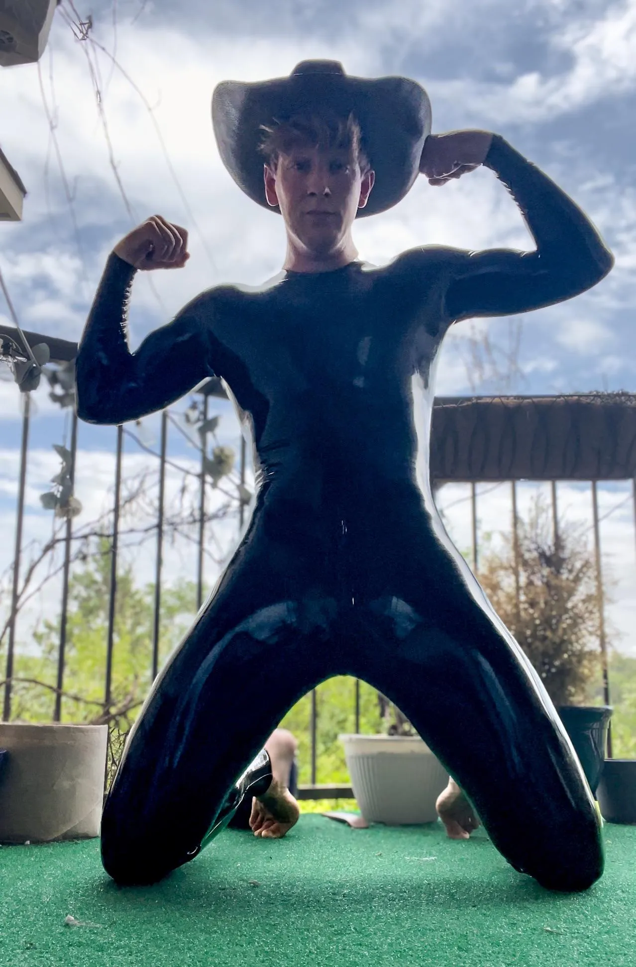 Latex cowboy that loves to ride