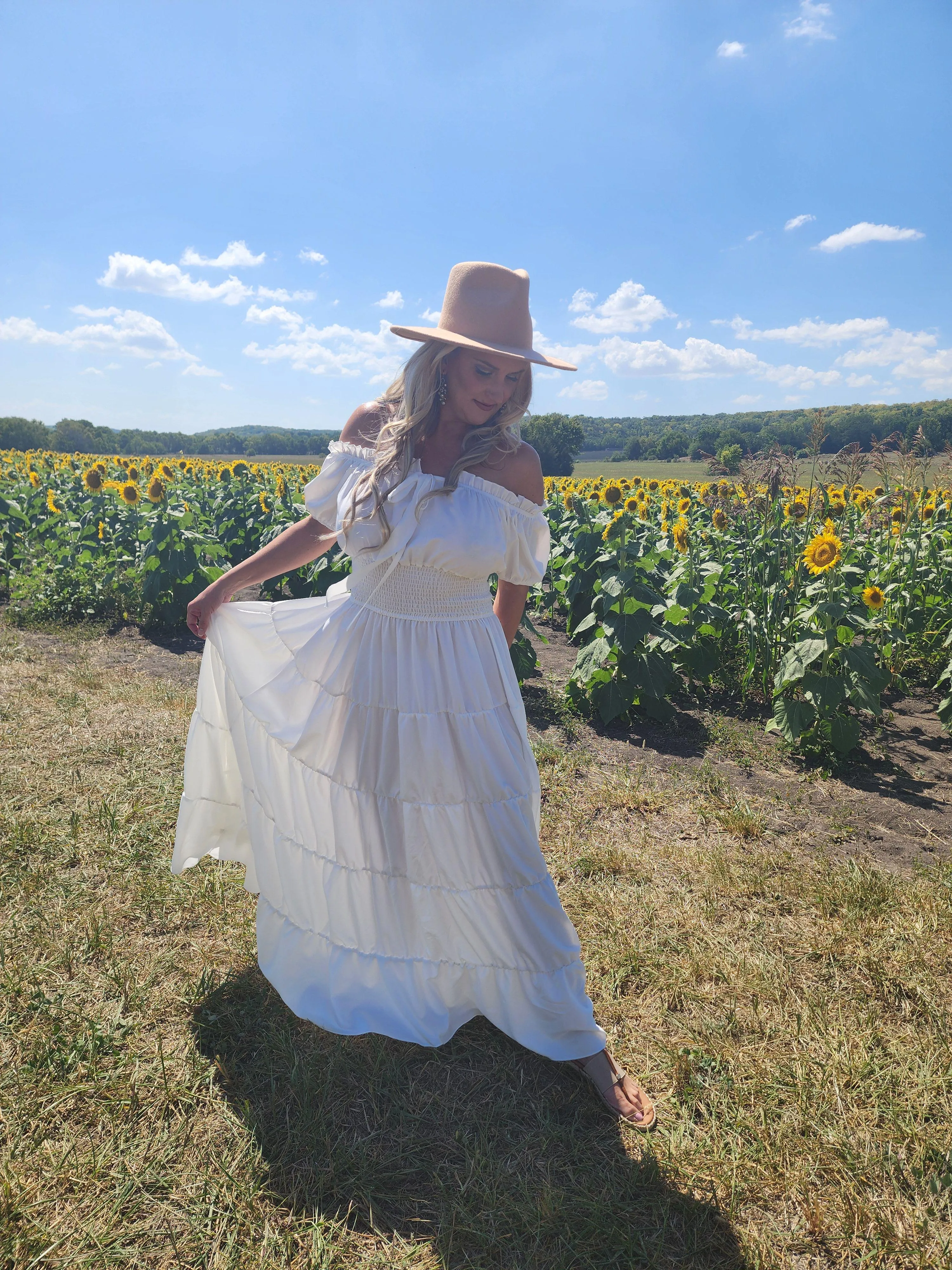 Country MILF in a see thru dress in a field of sunflowers